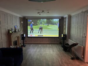 Projector screen setup in a home cinema installation.
